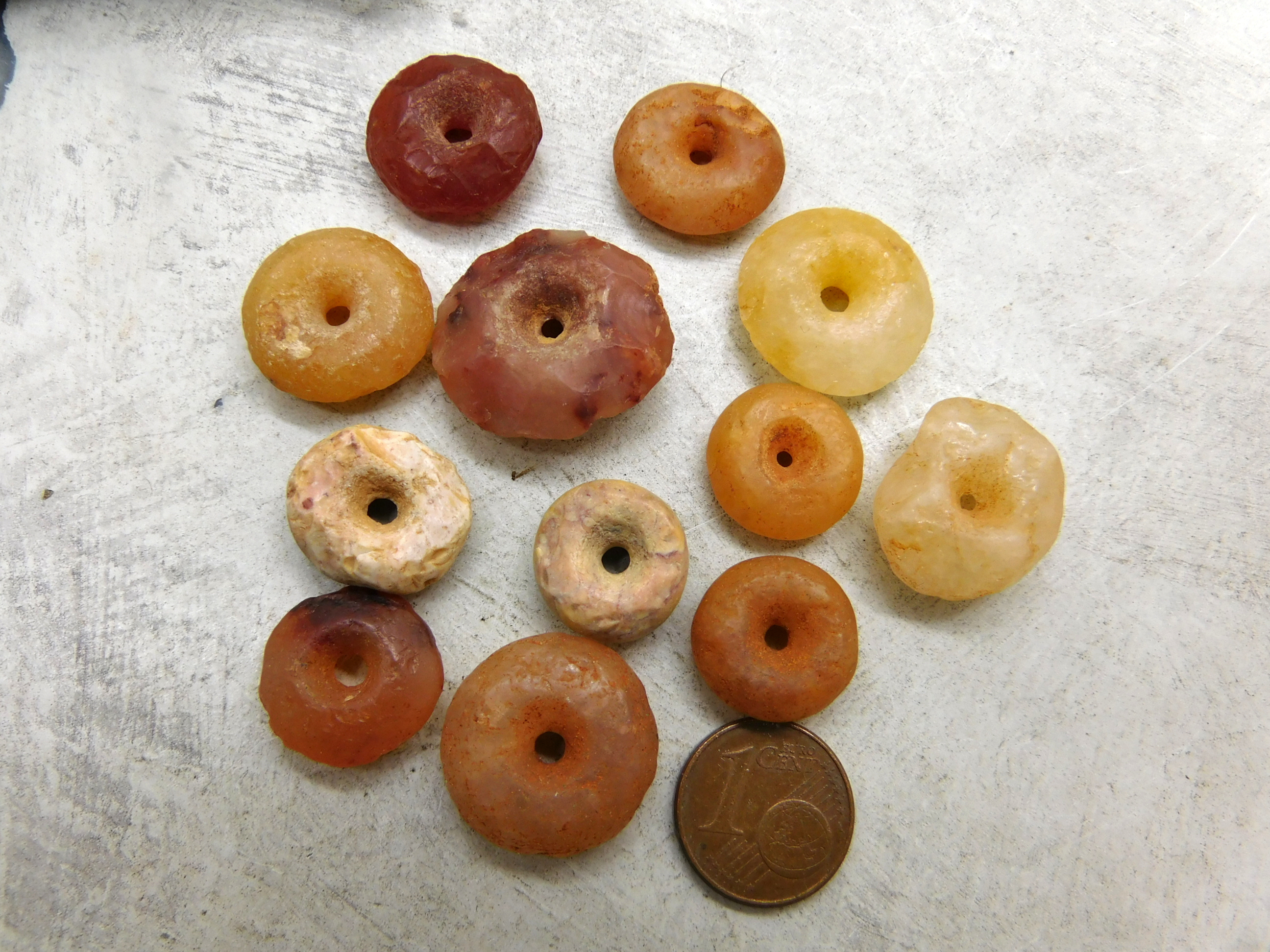 rare ancient stone beads from the Sahara desert, donuts, rondelles