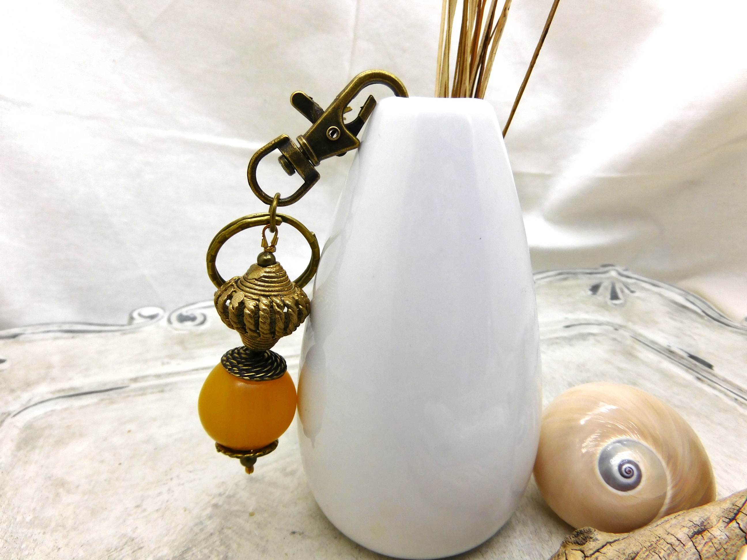 keychain / bag charm with resin amber bead and handmade brass bead