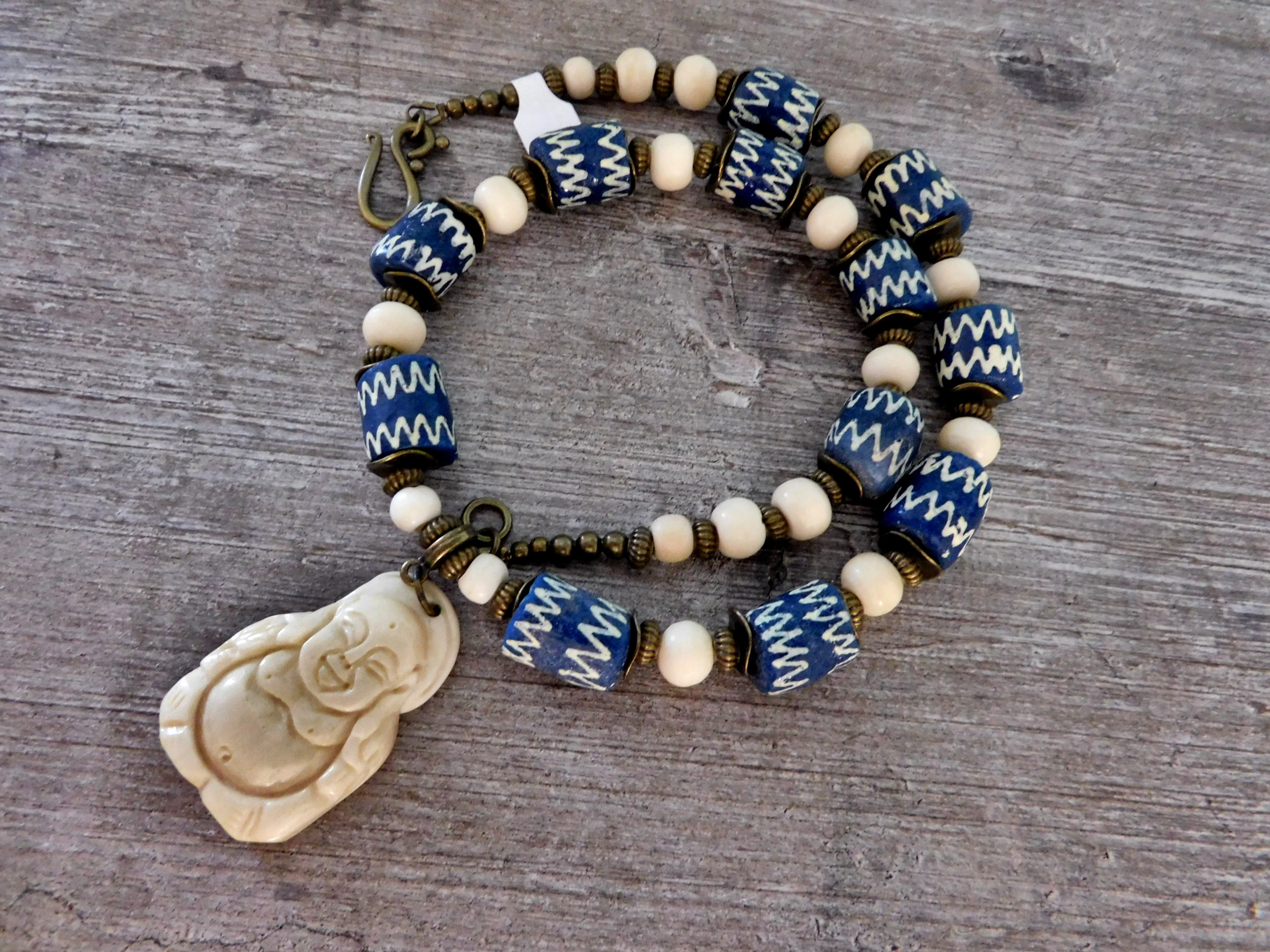 Buddha-necklace with powderglass beads and bone