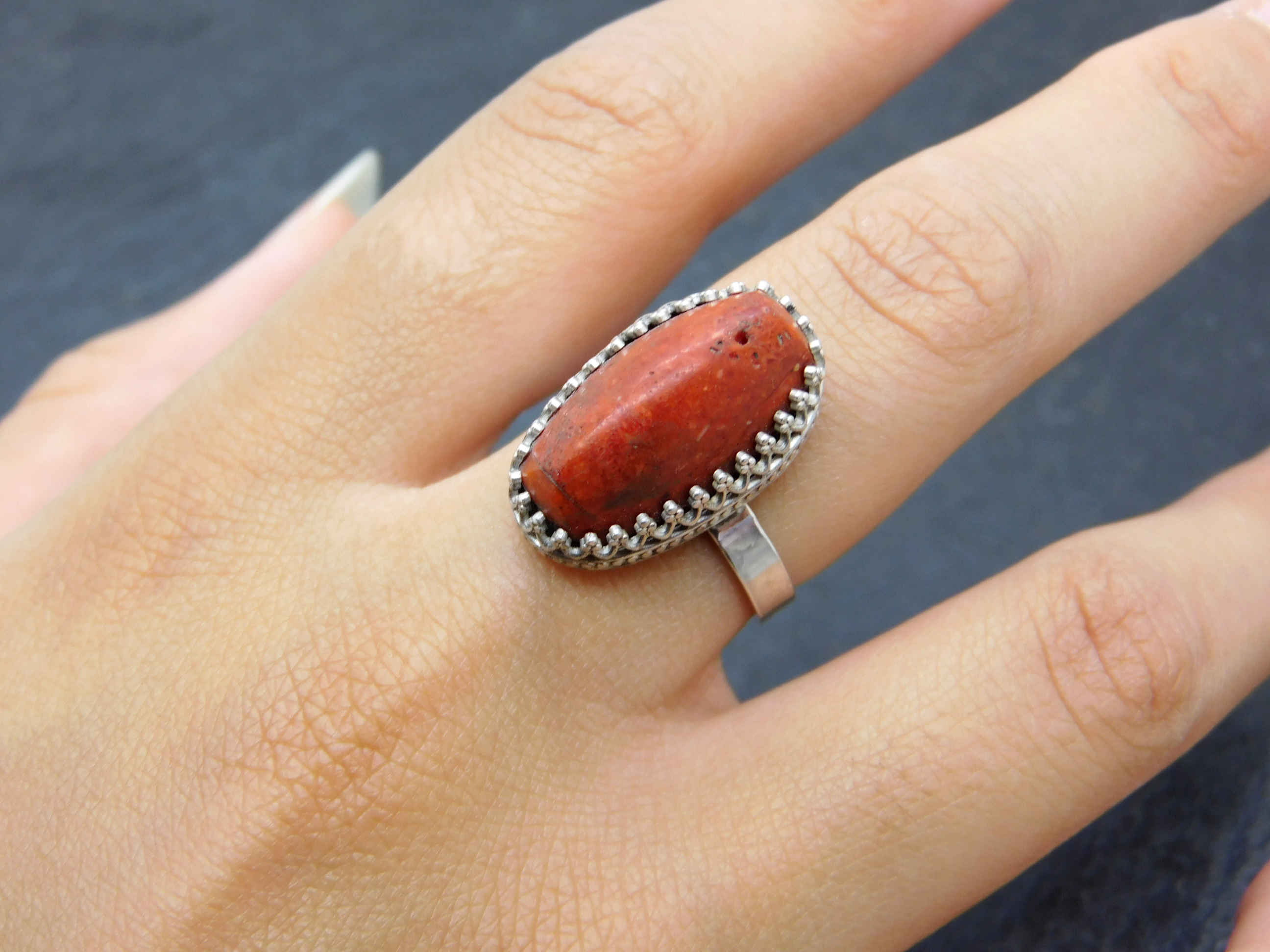 Sponge coral ring in hand forged decorative setting - Sterlingsilver