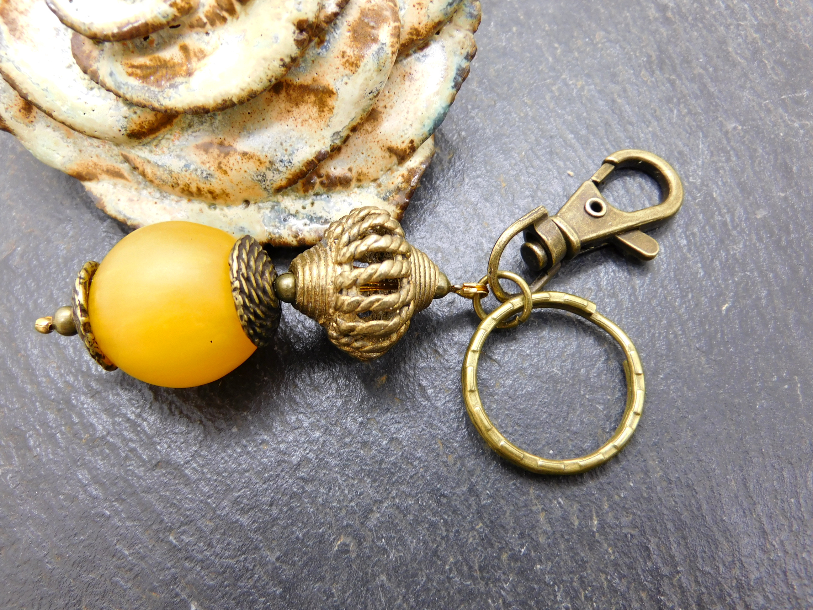 keychain / bag charm with resin amber bead and handmade brass bead