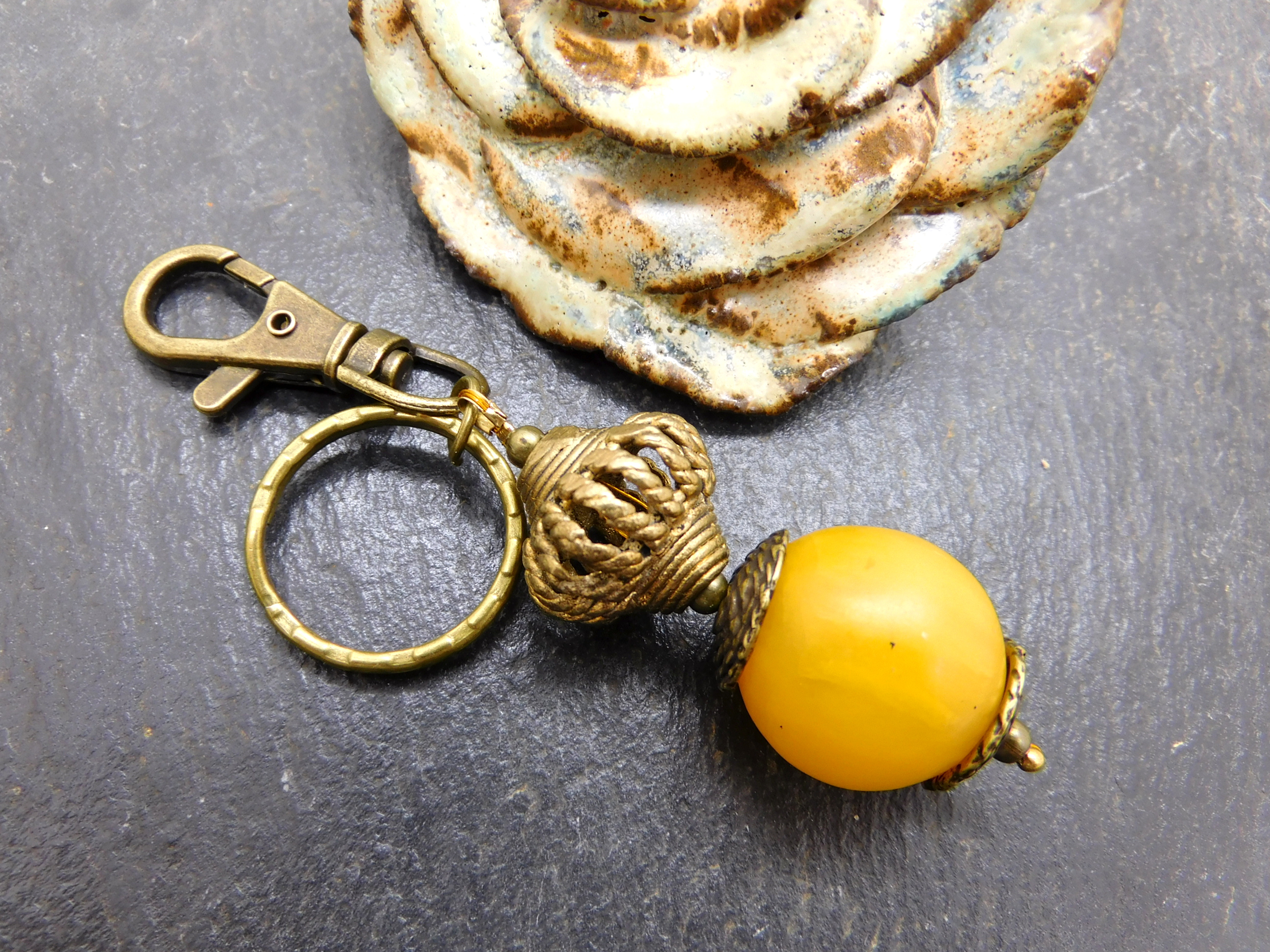 keychain / bag charm with resin amber bead and handmade brass bead