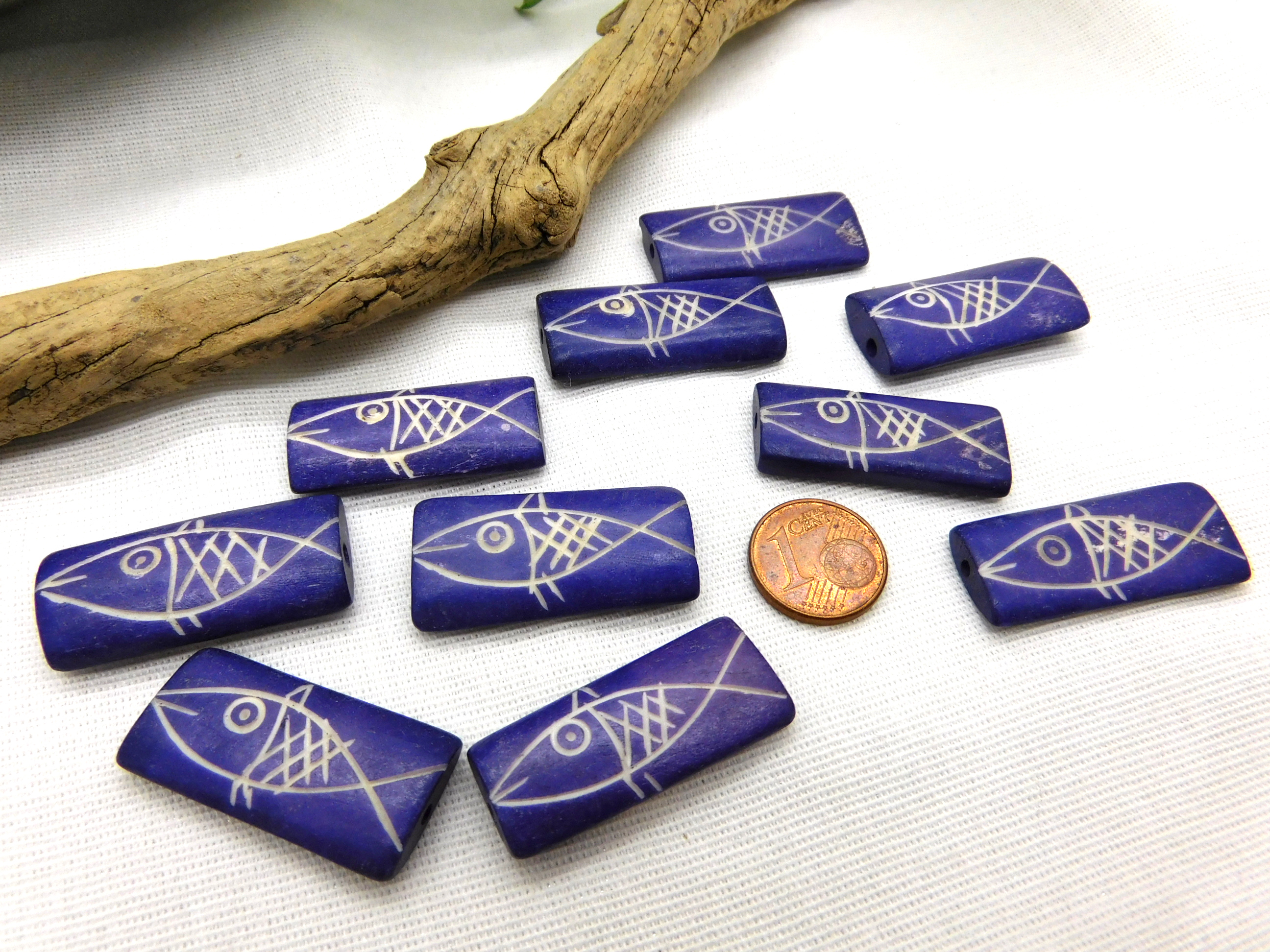 bone beads - purple with fish engraving