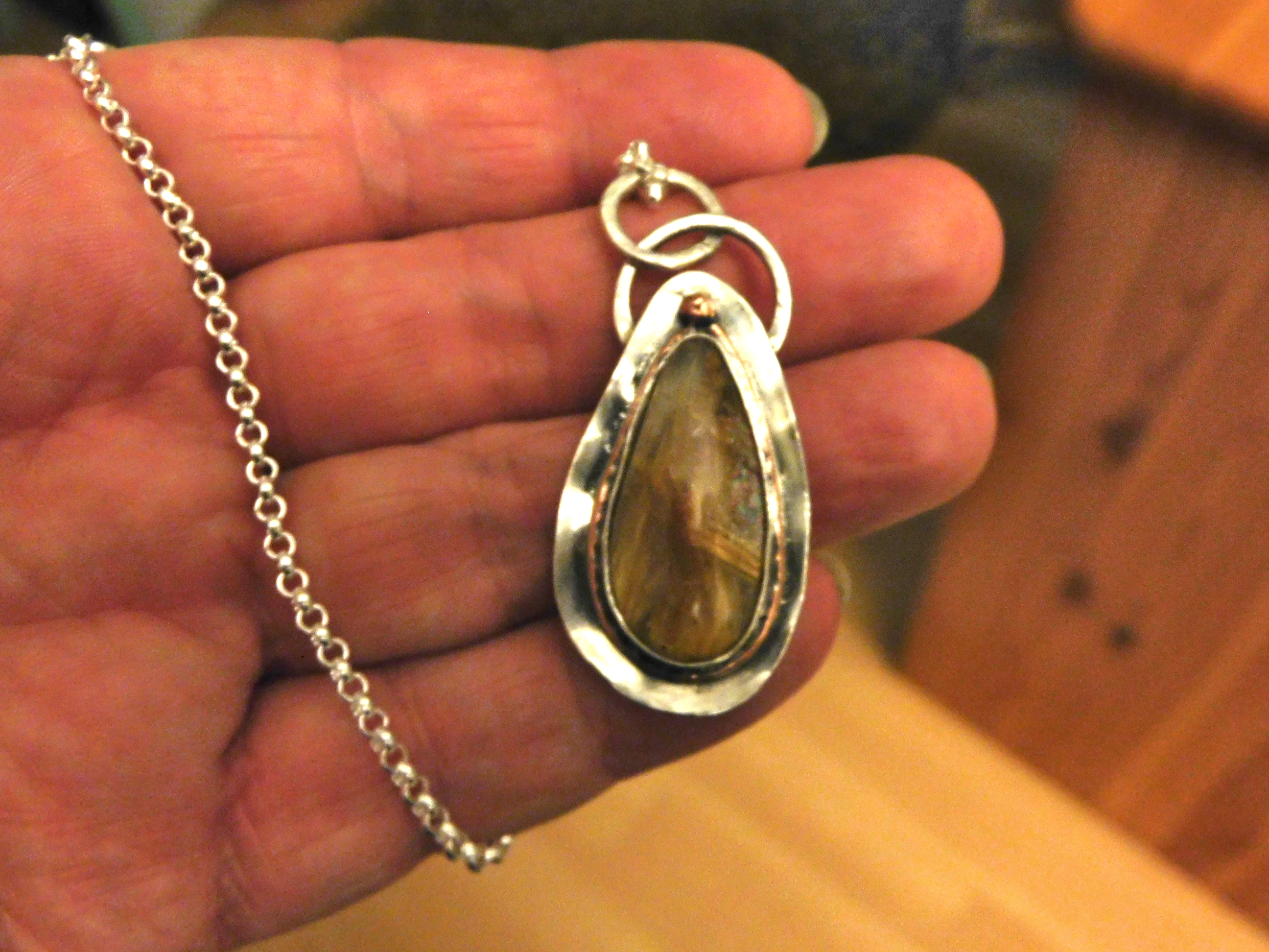 Pendant with rutilated Quartz stone set in sterling silver and copper