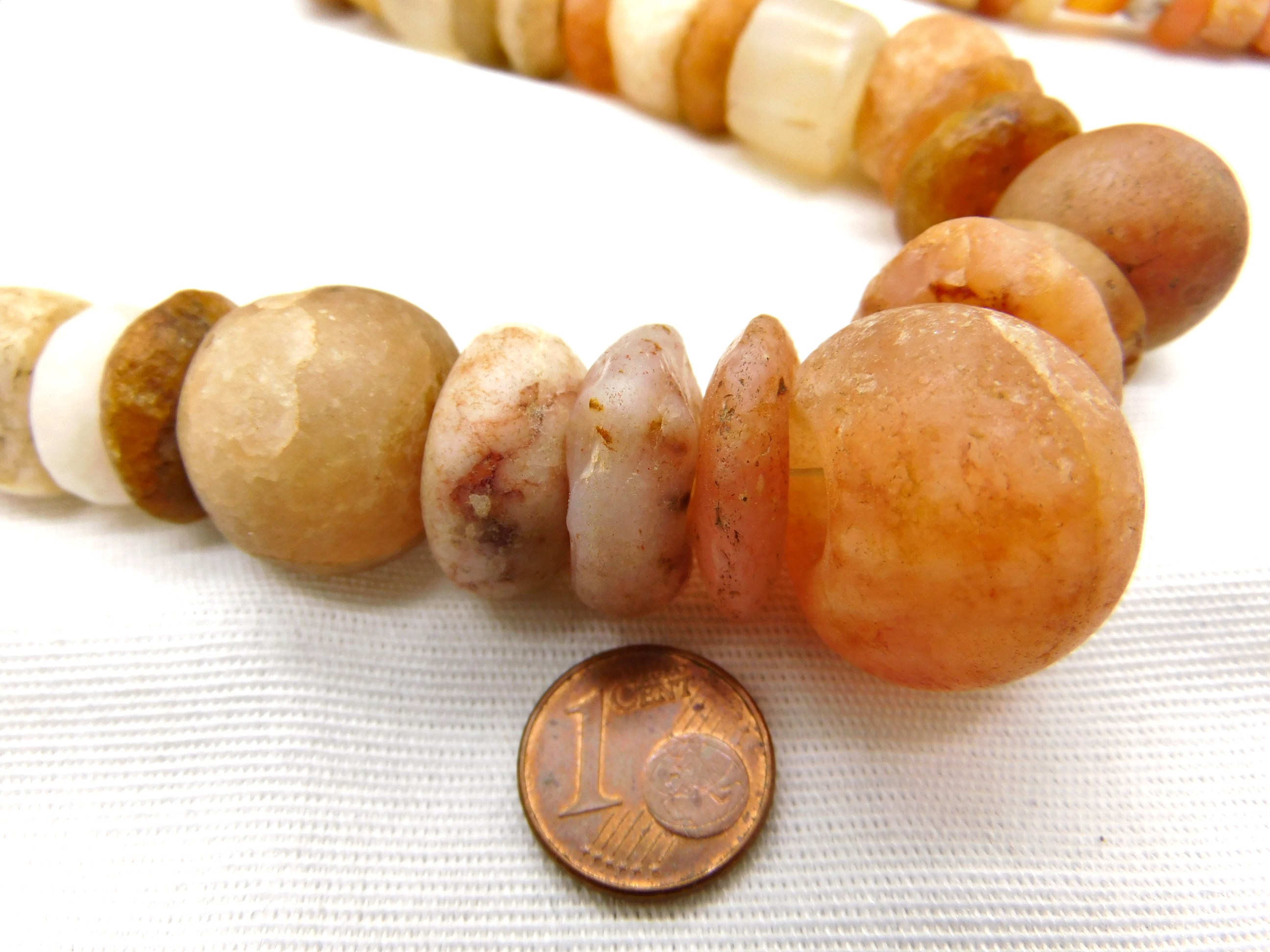 ancient stone beads from the Sahara desert, different stone types and shapes