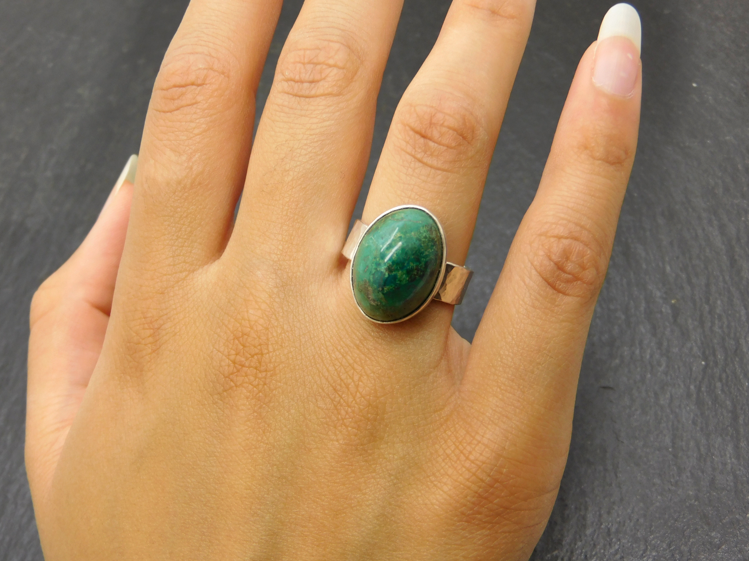 domed oval Chrysokolla ring in hand forged Sterlingsilver setting 